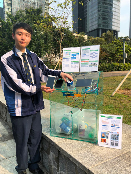 Lee Hok-yin, Secondary Four student from Christian Alliance SW Chan Memorial College and his winning masterpiece named Smart Aluminium Cans Recycling Box